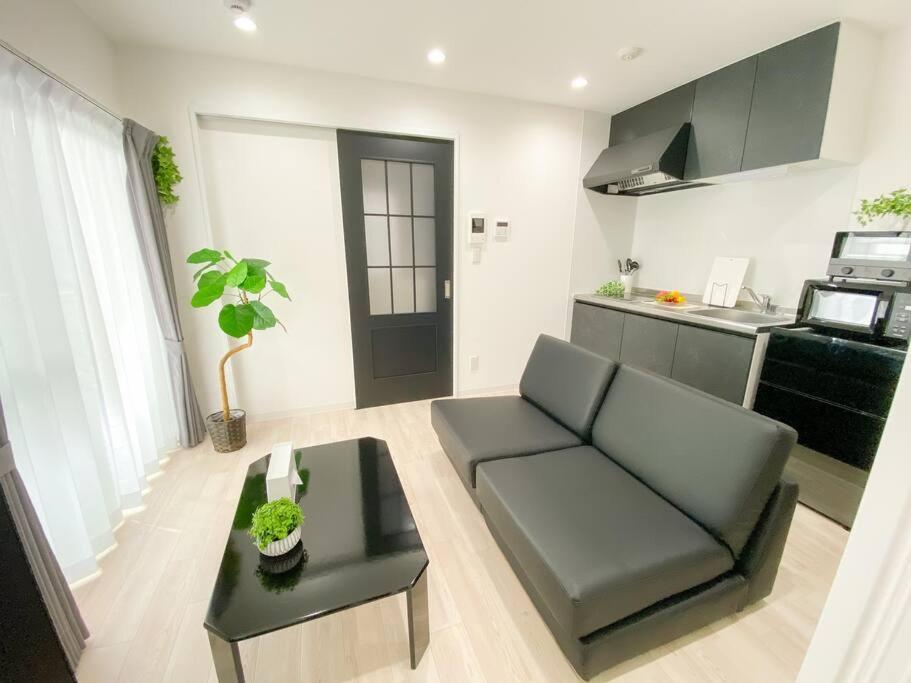 Residential Hotel Glitter Usjまで1駅5分 โอซาก้า ห้อง รูปภาพ
