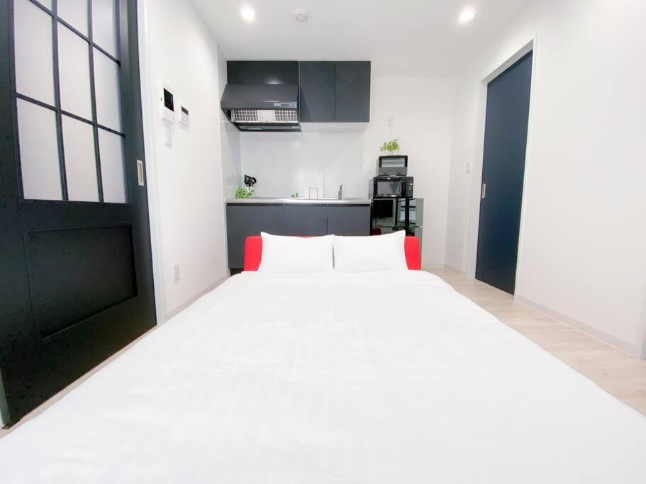 Residential Hotel Glitter Usjまで1駅5分 โอซาก้า ห้อง รูปภาพ