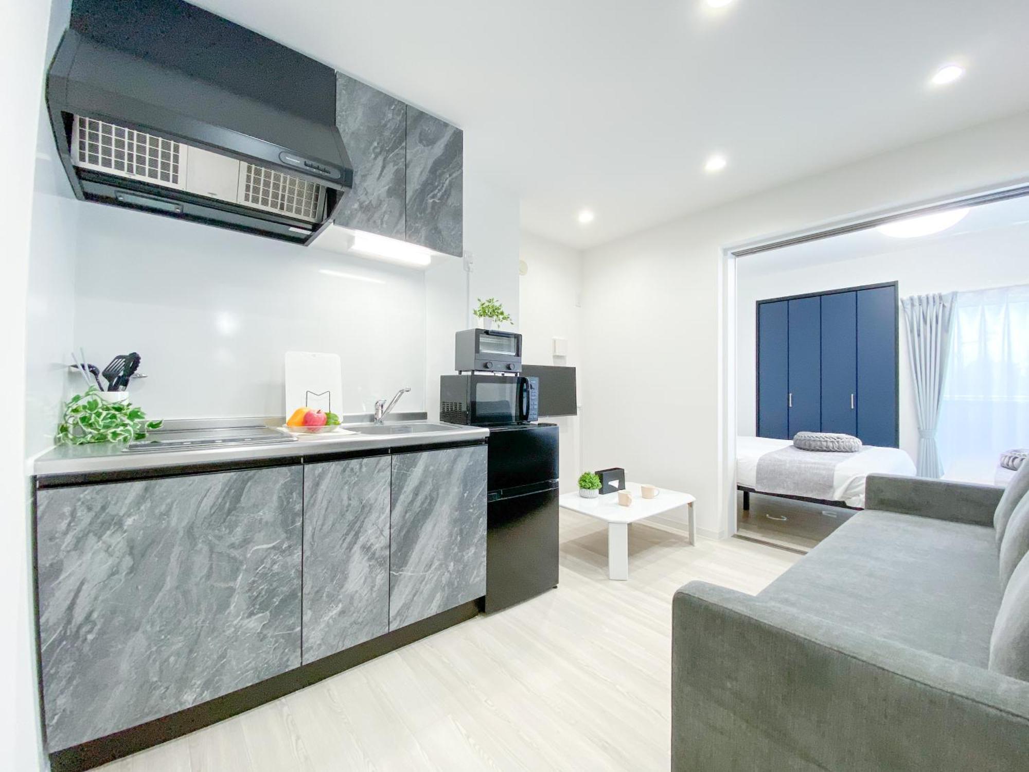 Residential Hotel Glitter Usjまで1駅5分 โอซาก้า ภายนอก รูปภาพ